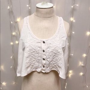 Urban Outfitter’s Ecote cropped embroidered vest